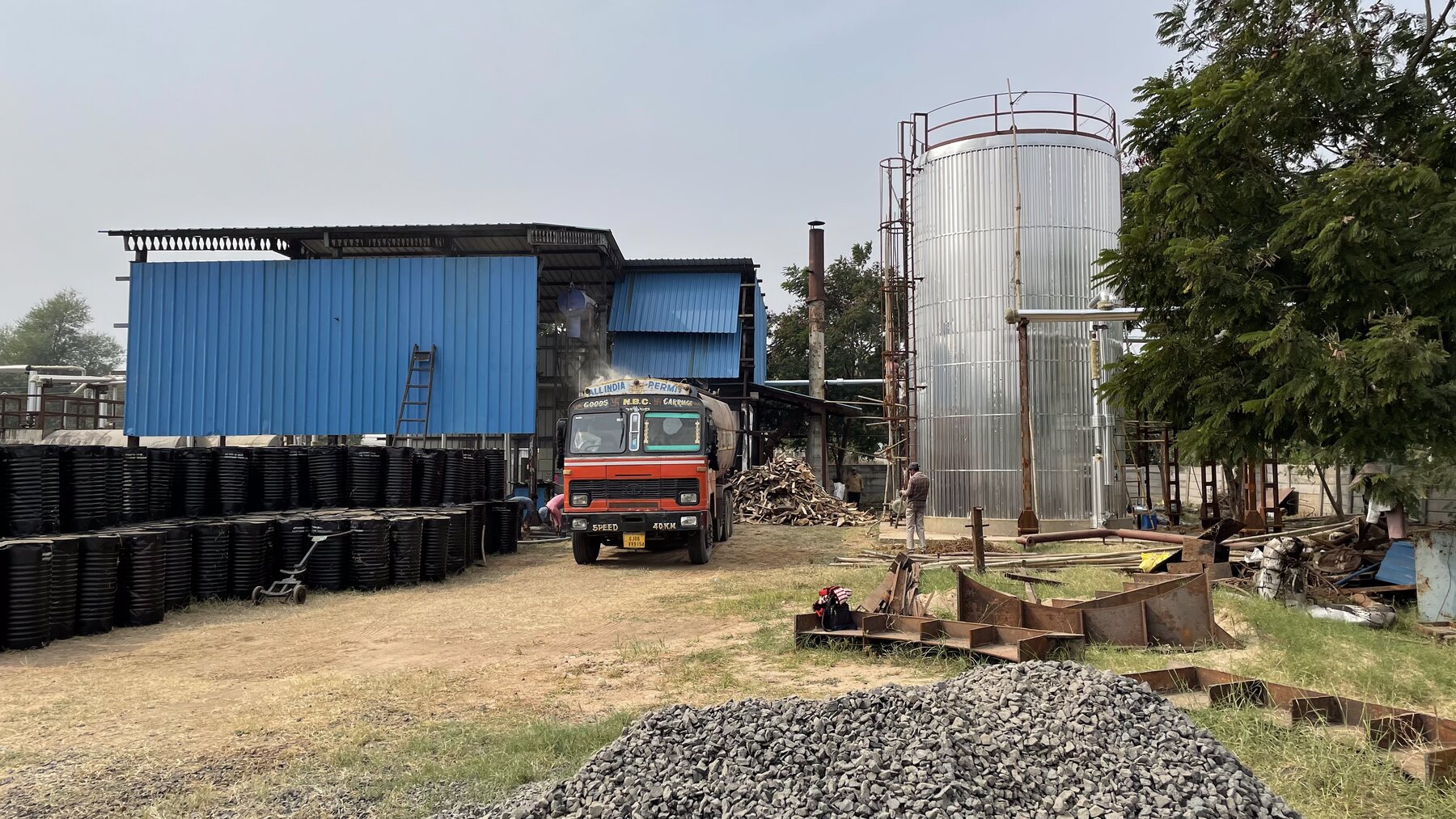 Brij Chemicals industrial yard with storage tank and vehicle